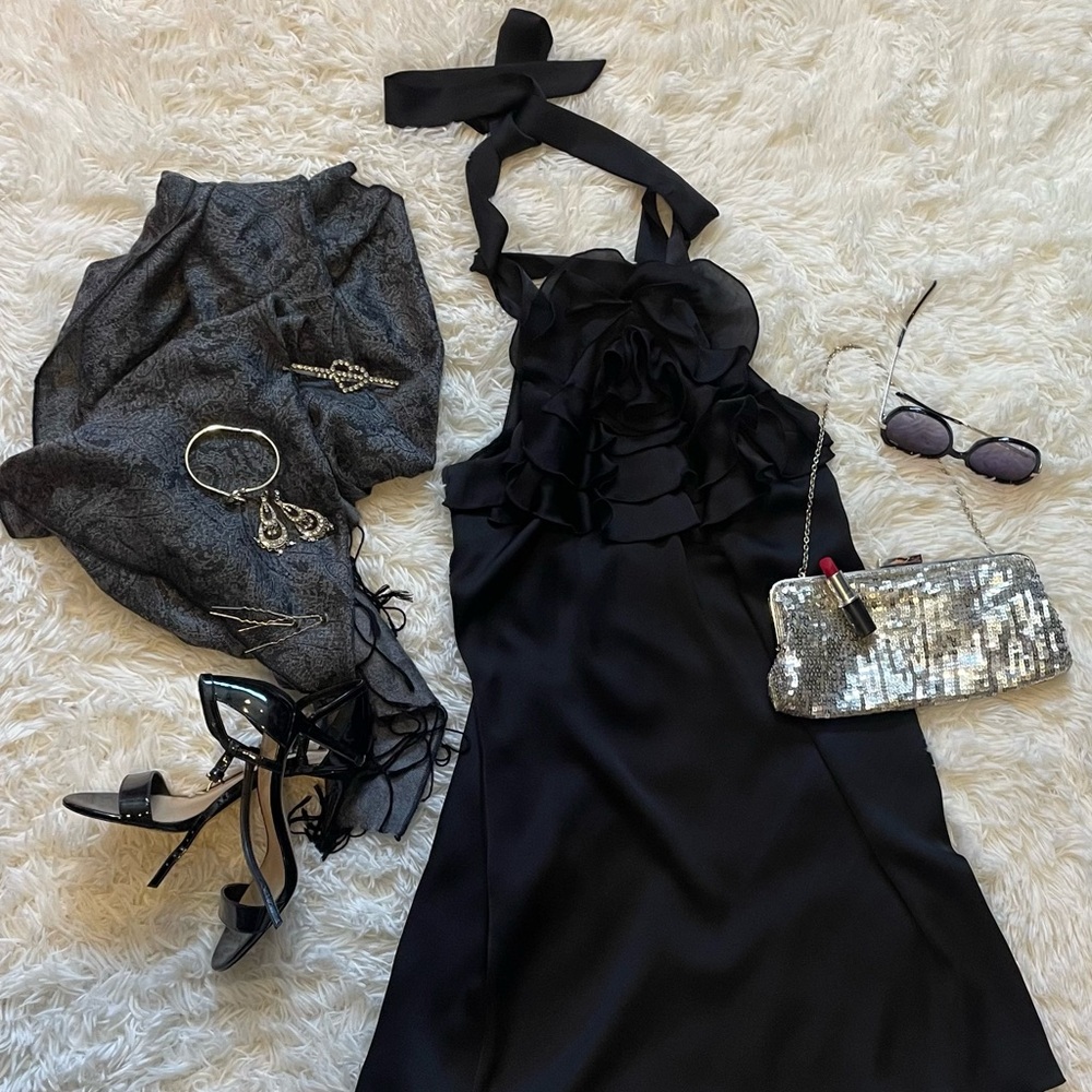 Brand new with tags. Black knee length dress. Express, size x-small